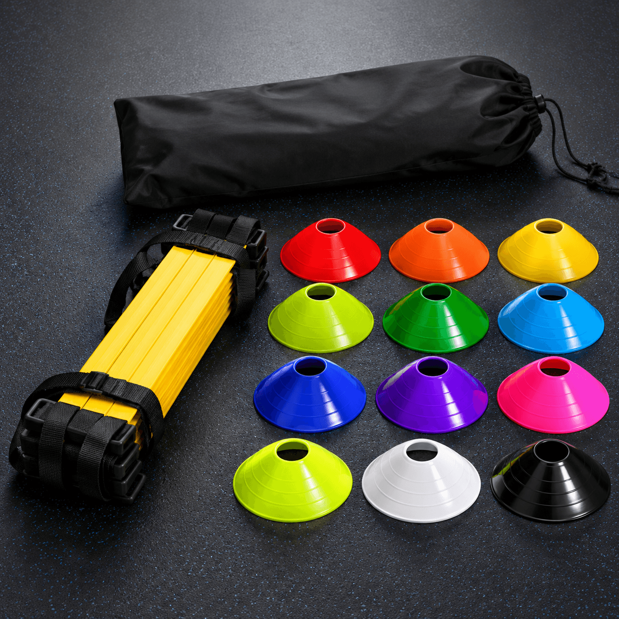 Unbranded colorful training cones and agility ladder on a gym floor